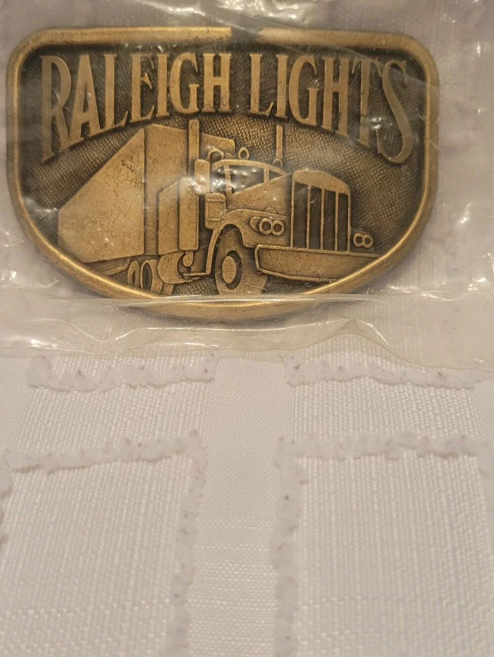 Raleigh Lights Brass Truck Belt Buckle - Gold Tone